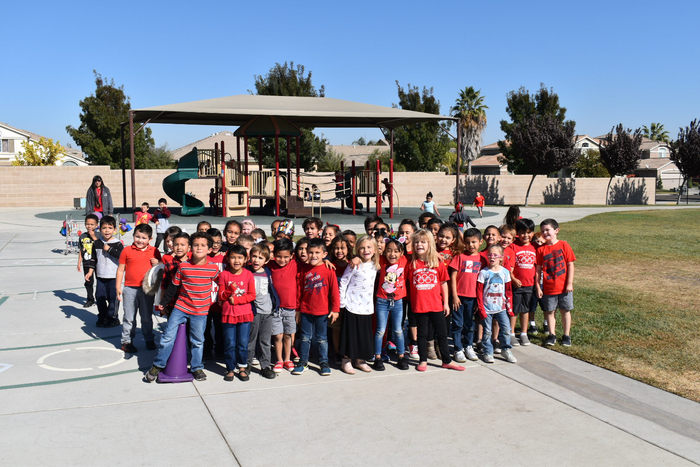 Group photo of students in red 