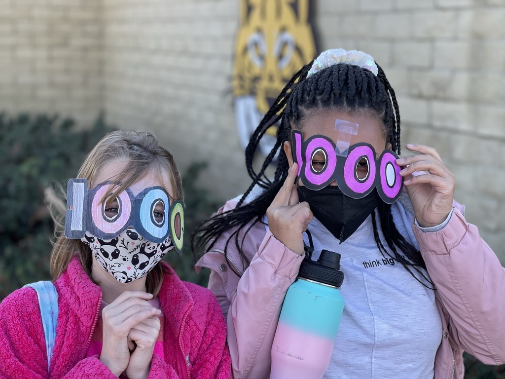 Image of two students with 1000 Day Glasses