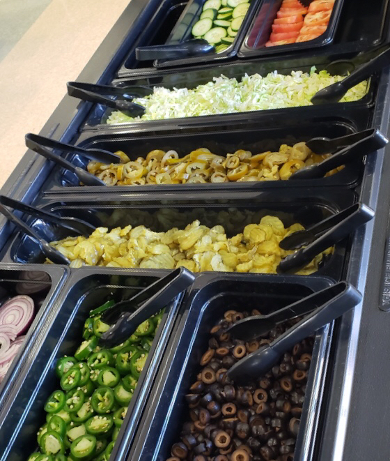 Topping bar for nachos and sandwiches 