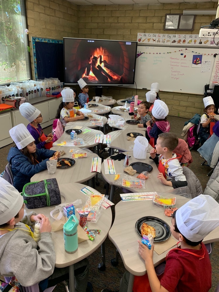 image of 1st graders with hats on