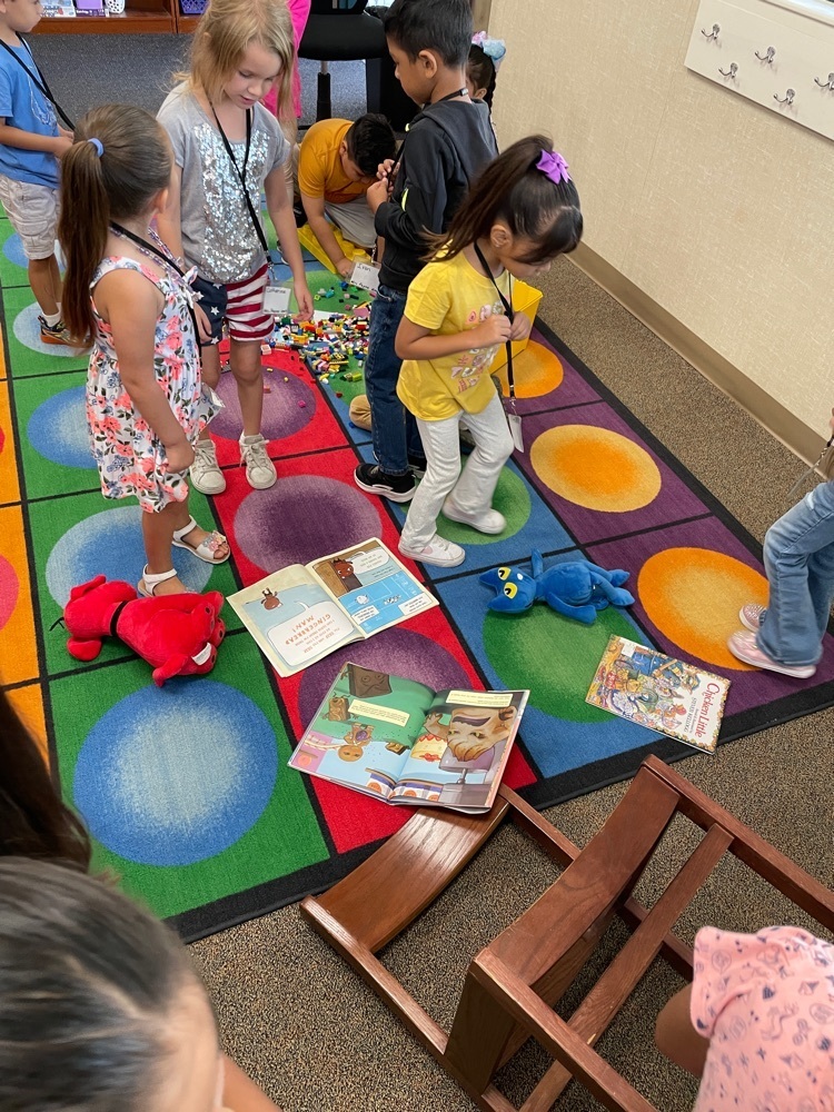 Kinder students visiting the library.